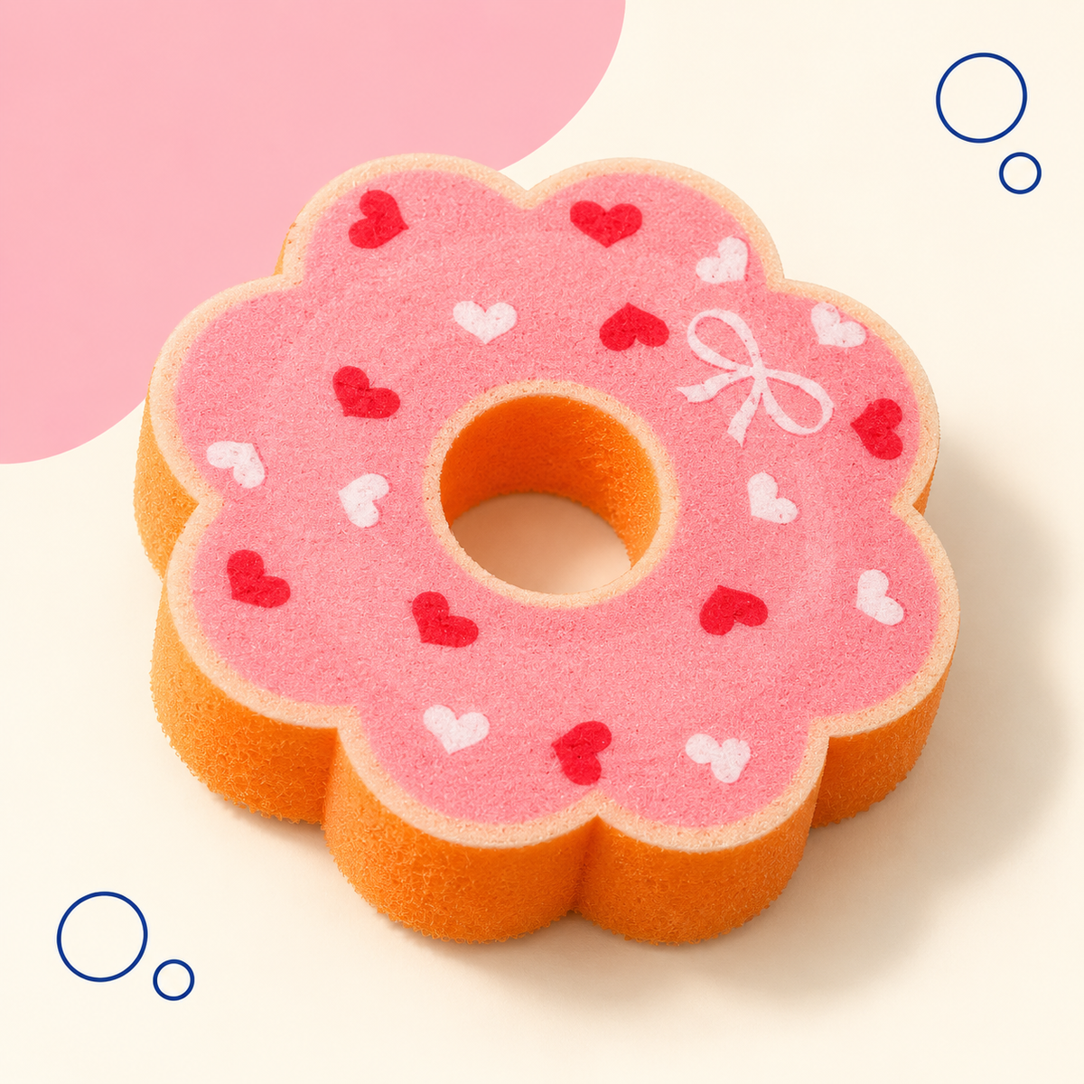 Scalloped Pink Heart Donut sponge with its orange porous body visible